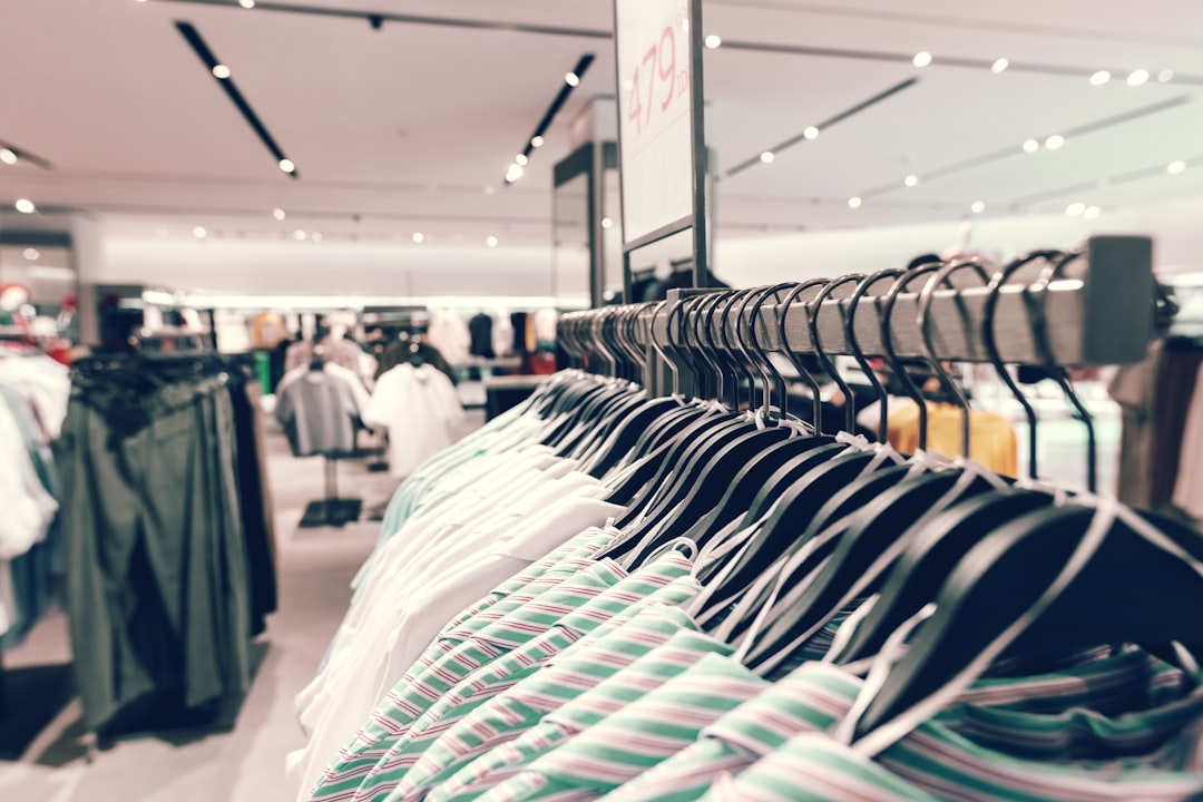 a-rack-of-shirts-in-a-clothing-store-b7jnv9nzqjc